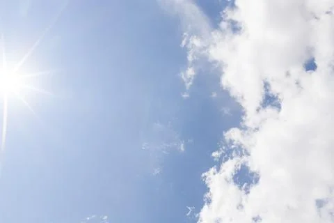 Soft White Cloud Edge Entering an Open Blue Daylight Sky Stock Photos