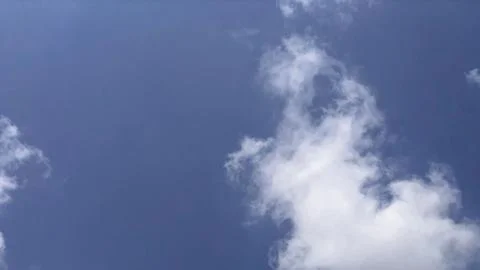 Soft White Cloud Formation in Bright Blue Summer Sky with Copy Space Fotos Stock