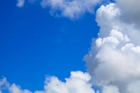 Soft white clouds against blue sky Stock Photos
