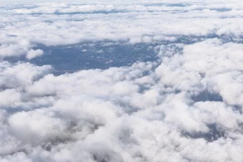 Soft white clouds blanket the sky 写真素材