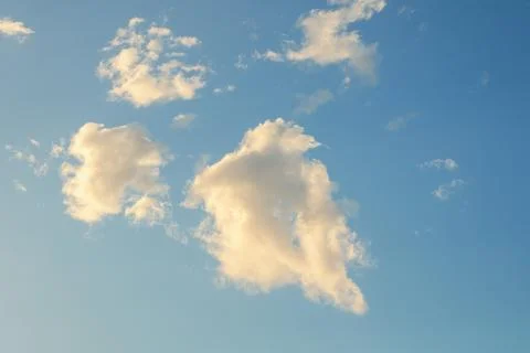 Soft White Clouds in a Blue Sky Фото