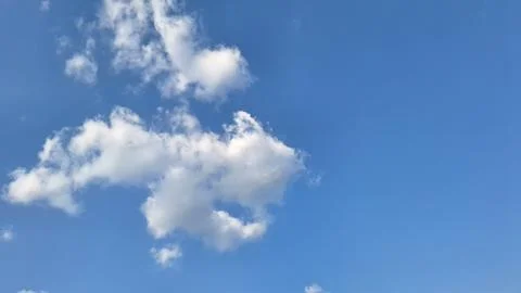 Soft White Clouds in Clear Blue Sky with Natural Minimal Background Space Stock Photos