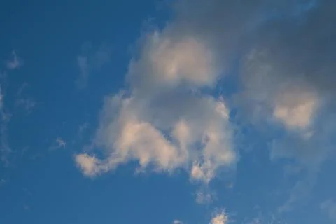 Soft White Clouds in a Clear Blue Sky 库存照片