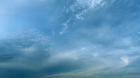 Soft white clouds moving on blue sky background. Tropical summer or spring Stock Photos