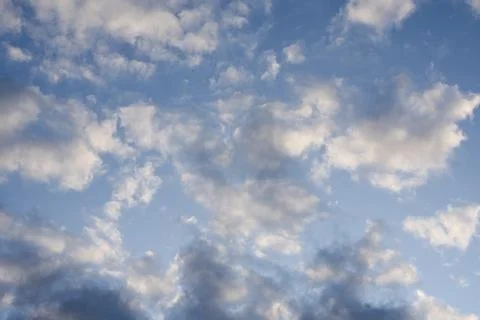 Soft White Cumulus Clouds in Vibrant Blue Sky Stock Photos