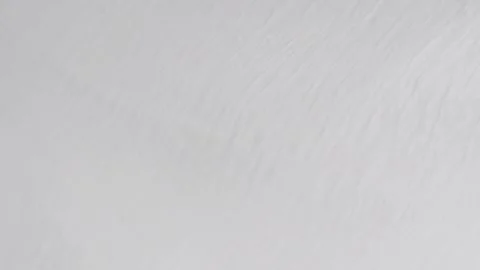 Soft white fabric with crinkled texture waving Stock Footage 338332757