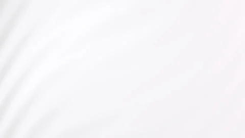 Soft white fabric gently draping, creating a serene atmosphere Stock Footage 310664556