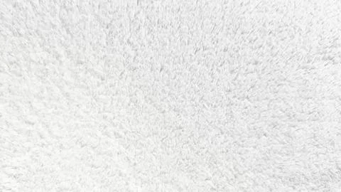 Soft white fleece texture evokes cozy minimalist warmth in a full frame macro 写真素材