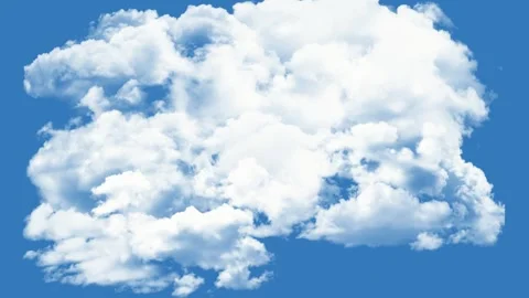 Soft white fluffy clouds drifting slowly across a bright clear blue sky Stock Footage 335495312