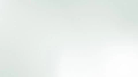 Soft white gradient with subtle grain texture, seamless loop background, 4K. Stockbeeldmateriaal 309855622