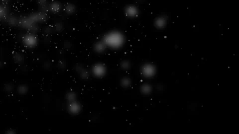 Soft white particles drifting in dark space, subtle dust and bokeh motion on Stock Footage 328707435