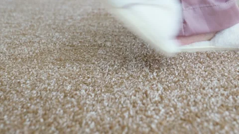 Soft white slippers on the beige Interior pile carpet. Video stock 307497604
