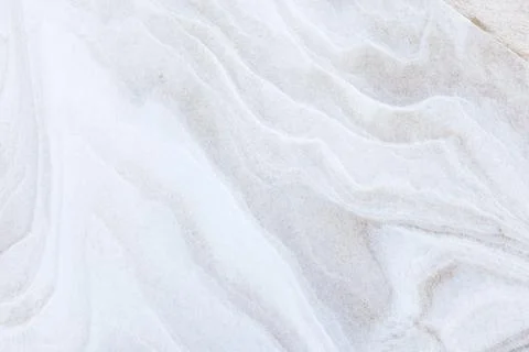 Soft white snowdrift with sand with delicate ripple patterns Stock Photos