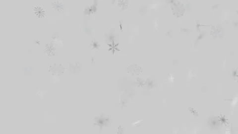 Soft white snowflakes falling gently against light grey background Vidéo 346243746