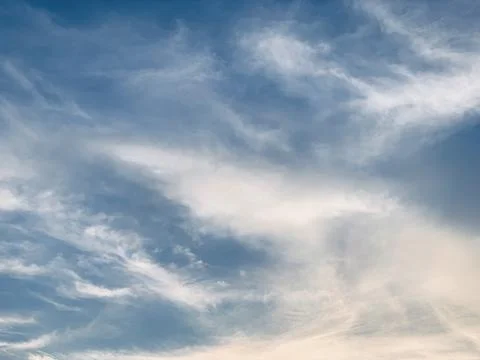 Soft Wispy Clouds in Blue Sky with Warm Sunlight Image Jakarta Indonesia Stock Photos