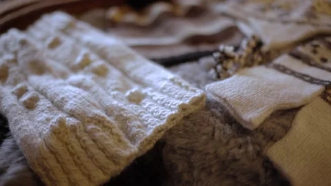 Soft wool caps and scarves made from alpaca fleece Video stock 151651372