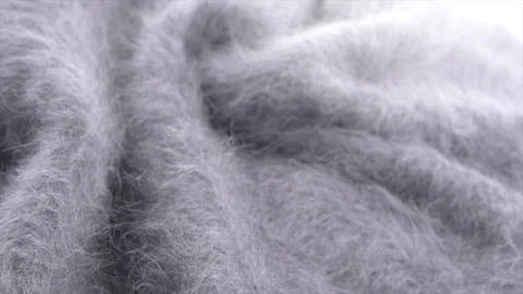 Soft wool grey background. Alpaca gray wool mohair clothes texture closeup Stock Footage