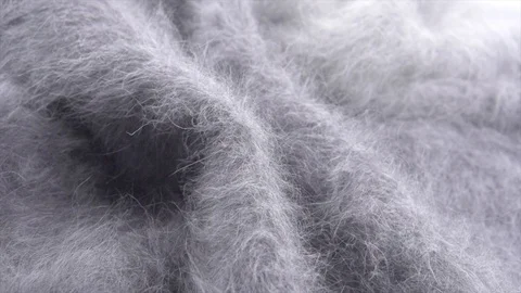 Soft wool grey background. Alpaca gray wool mohair clothes texture closeup Stock Footage 102379247