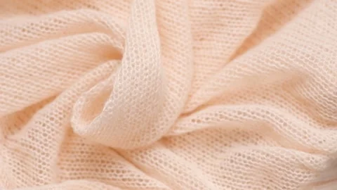 Soft Wool knitted background. Light pink pastel Alpaca wool mohair clothes Stock Footage 330538572
