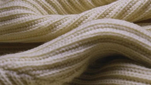 Soft Woolen jumper showing knitted ribbed pattern design SLIDE SHOT Stock Footage 308683606