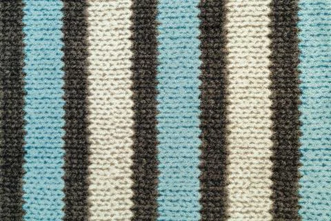 Soft woven fabric with striped pattern in blue, white and brown. Close up tex Stock Photos