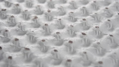 Soft wrinkled textured dotted wrapping paper. Grunge cardboard texture. Macro Stock Footage 167222547