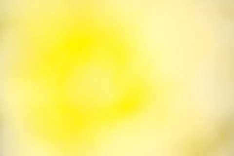 Soft Yellow Abstract Background with Bright Central Glow Stock Photos