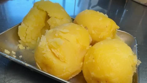 Soft Yellow Potatoes Broken into Pieces with a Spoon, Japanese Kitchen Culture Stock Footage 344254243