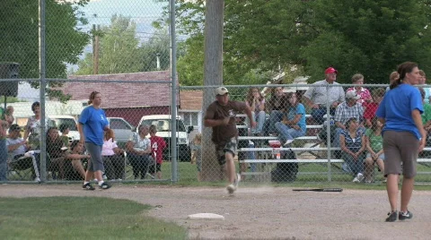 Softball game to first small town M HD Stock Footage 234982