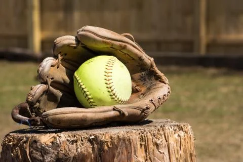 Softball with glove Stock Photos