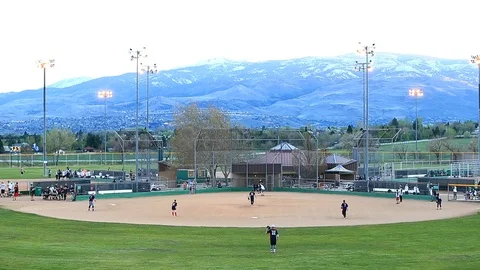 Softball Players on Field in Reno Nevada - Shallow Depth of Field Video stock 106921079
