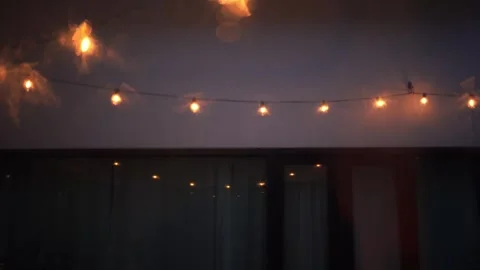 Softfocus lighting during rain drop on window Stock Footage 250952023