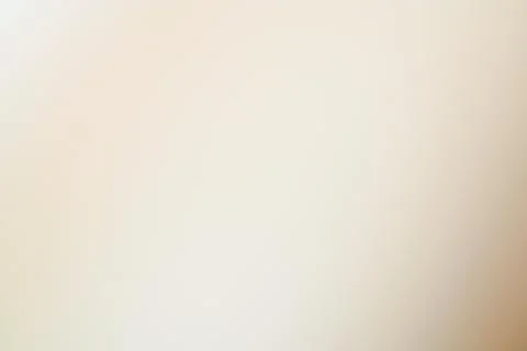 Softly Blended Beige Background with Subtle Gradient for Various Designs Stock Photos