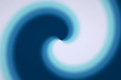 A softly blurred spiral vortex curls inward through deep blue, cyan, and pa.. Illustrazione stock