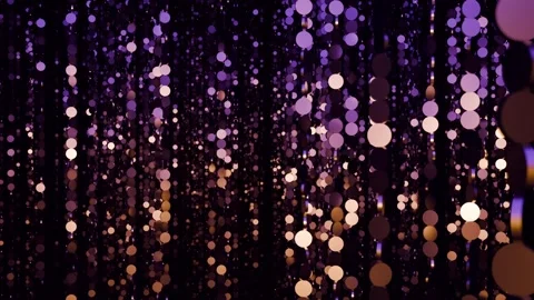 Softly glowing bokeh circles in rich purple, violet, and warm golden hues Stock Footage 326494352