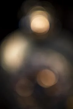 Softly glowing lights create a mesmerizing atmosphere in a darkened room Stock Photos