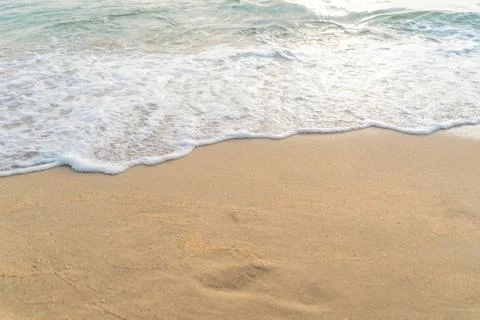 Softly wave on the beach sunset Foto stock