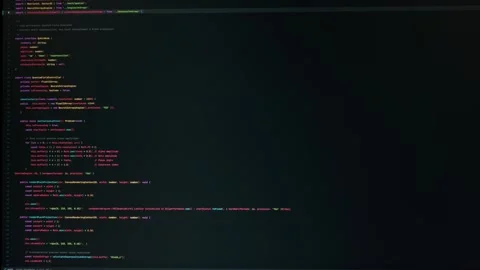 Software Code Running on Computer Screen in Dark Workspace Close-Up Stock Footage 347518683