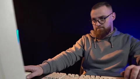 Software Developer From 1990's Working on Desktop Computer Looking at Cathode Stock Footage 302473407