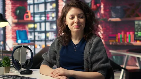 Software developer at agency office coding on her computer, Stock Footage 308670842