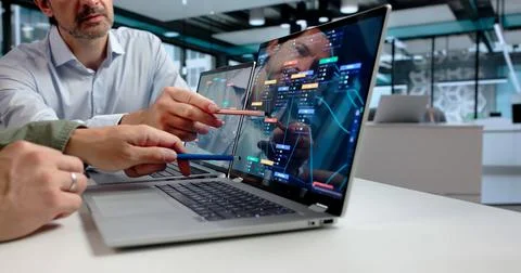 Software Developer And Designer Collaborate Using Laptop To Build Workflow Pl 스톡 사진