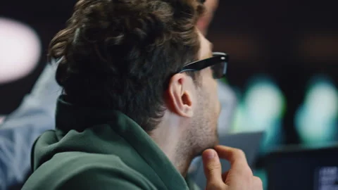 Software developer asking colleague woman discussing work at datacenter closeup Stock Footage 260245986