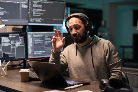 Software developer attending video call conference Foto stock