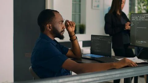 Software developer brainstorming ideas to write code and create new interface Foto stock