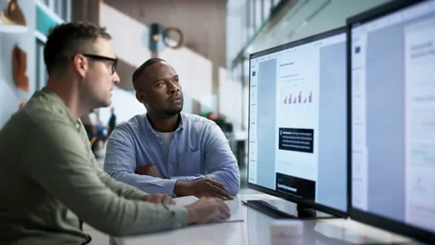 Software Developer Carefully Studies Artificial Intelligence Implementation Video stock 346321888