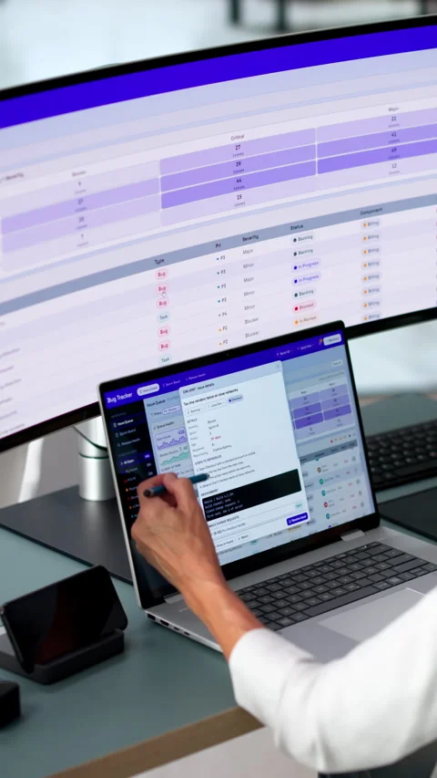 Software Developer Carefully Tracking Bug Reports Stock Footage 346326314