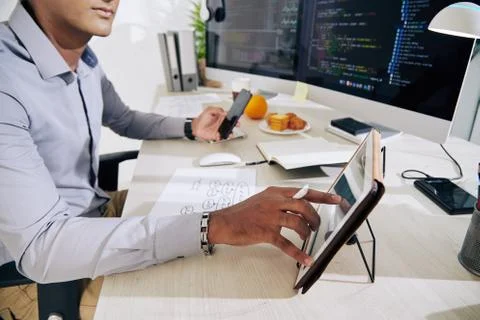 Software developer checking data Stock Photos