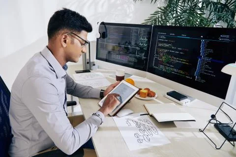 Software developer checking mindmap Stock Photos