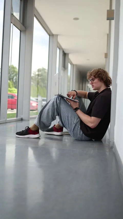 Software developer codes anywhere with laptop and focused mindset Stock Footage 337850335