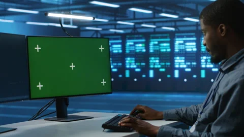 Software developer coding on green screen computer, upgrading equipment Stock Footage 276139571